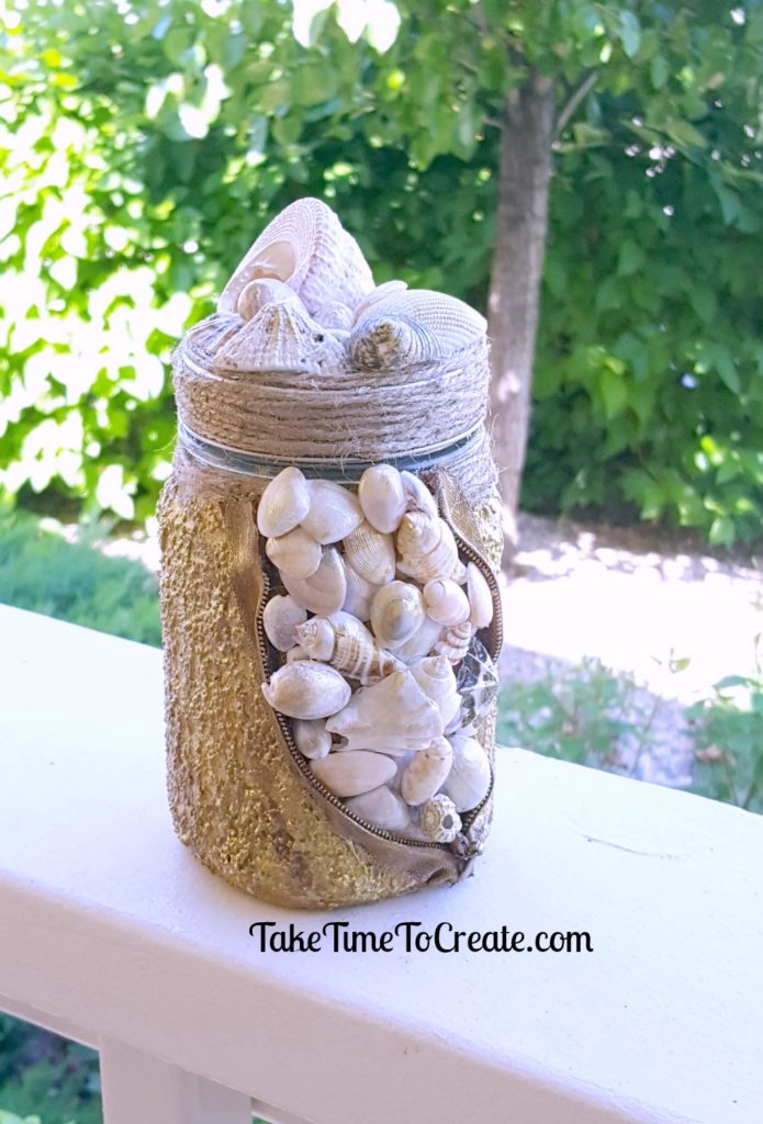 Altered sea shell mason jar